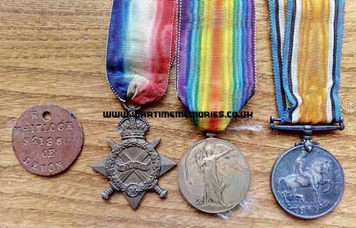<p>Robert's medals and ID tag